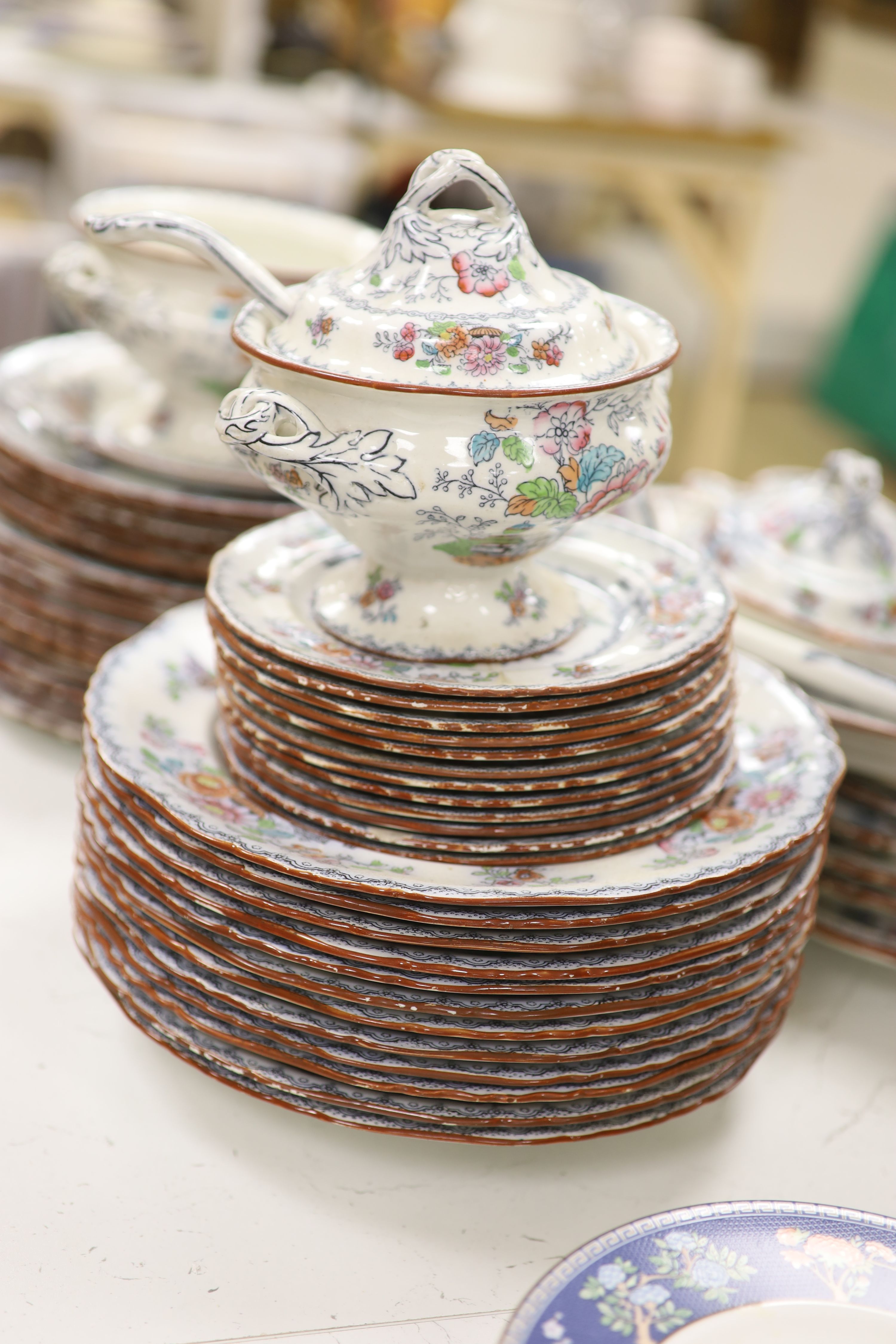 A Victorian Ashworth ironstone part dinner service